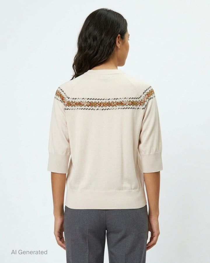 Dries Van Noten cream knit top with three-quarter sleeves, mock neck, and a multicolour Fair Isle jacquard yoke band featuring red, green, and black floral motifs - back