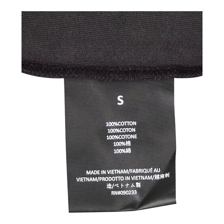 Fear of God ESSENTIALS women's slim mockneck tee in black with ribbed high neck, short sleeves and small white logo at the centre chest - packshot