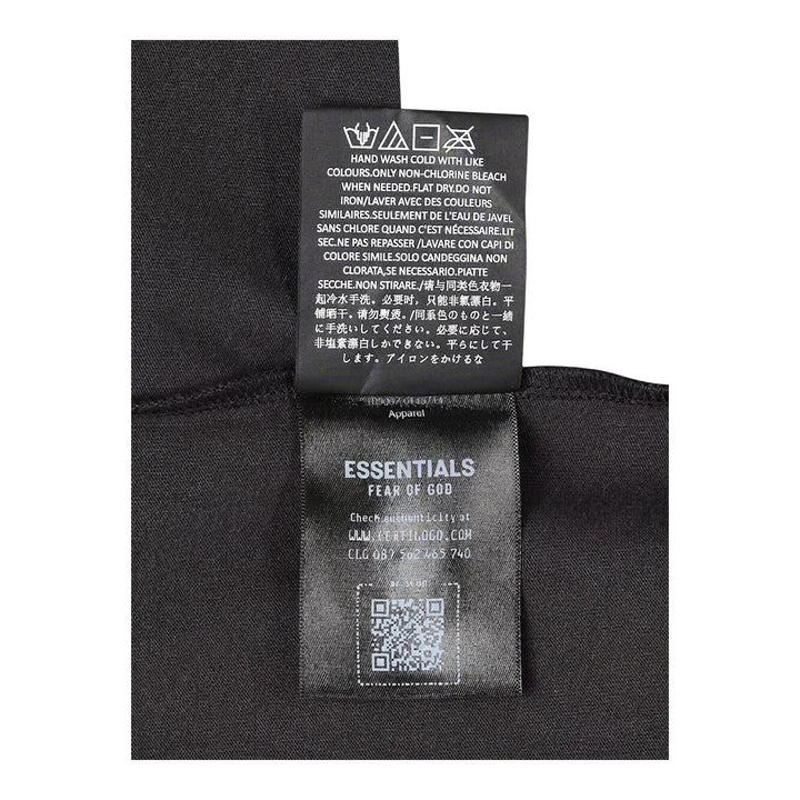 Fear of God ESSENTIALS women's slim mockneck tee in black with ribbed high neck, short sleeves and small white logo at the centre chest - packshot