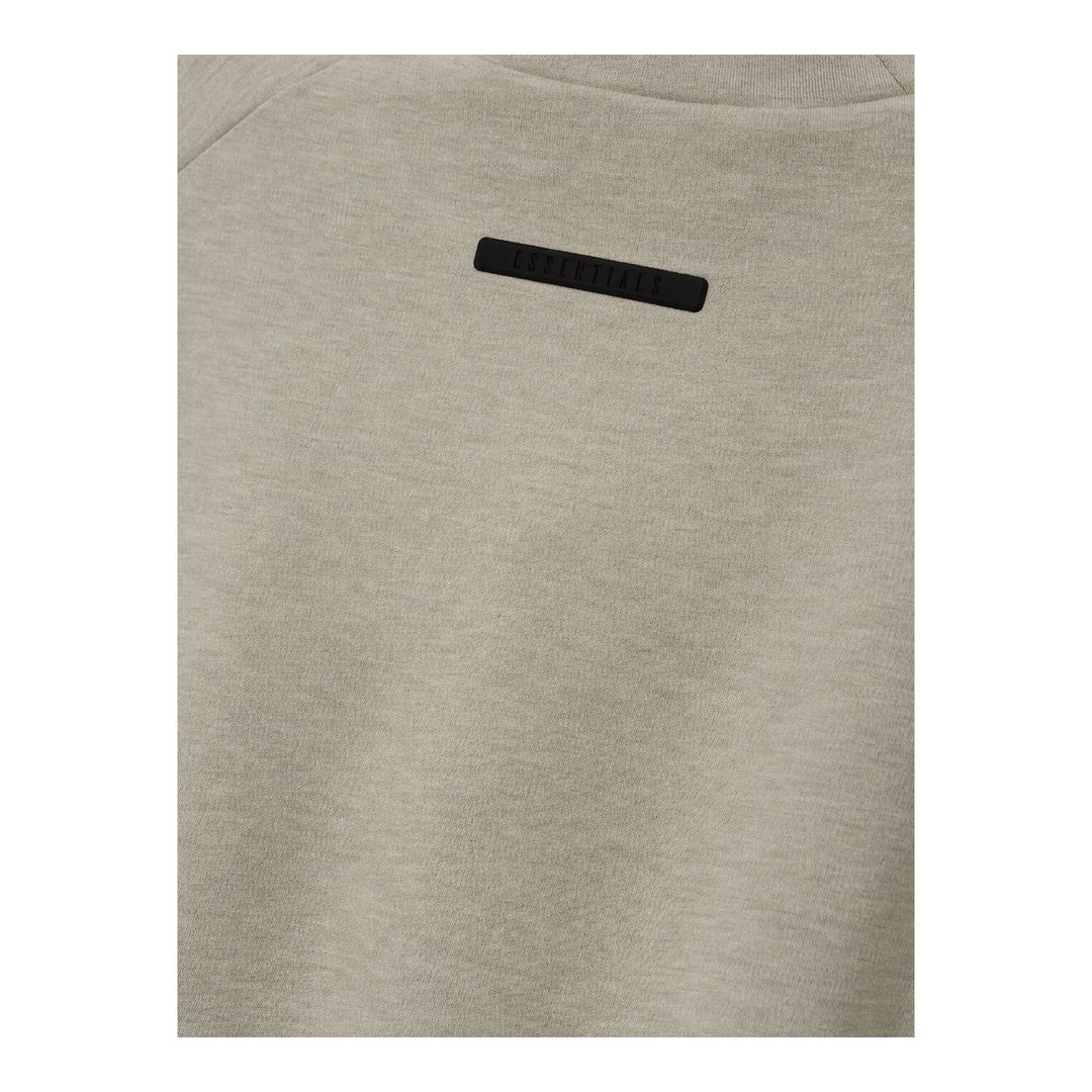 Fear of God Essentials women's tight tee in heathered taupe-grey with mock neckline and short sleeves, shown flat against a white background - packshot