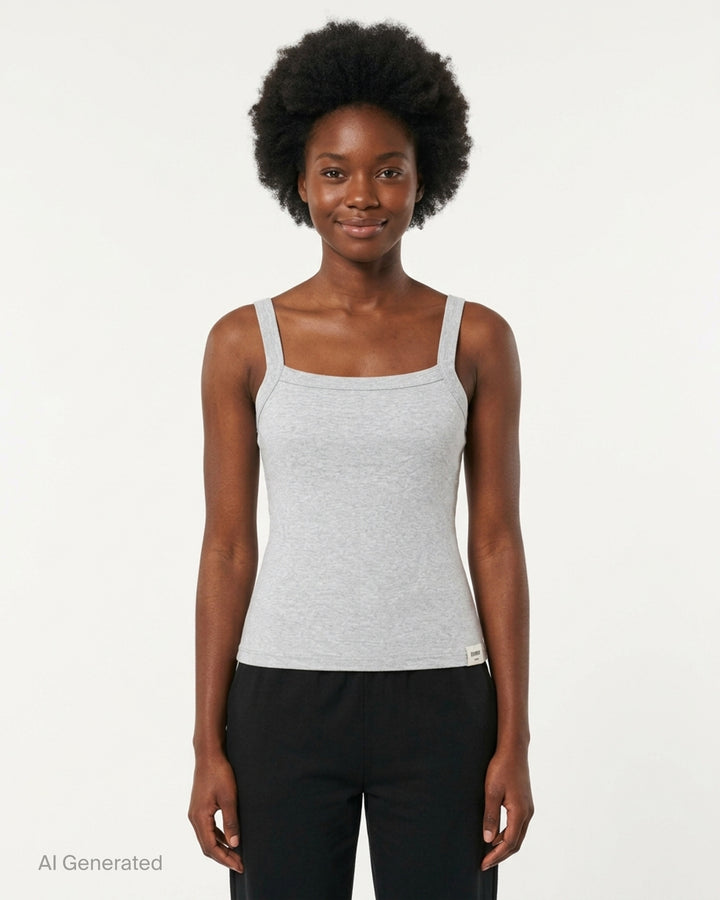 Glowny Classic Tank Top in black, featuring a square neckline, thin straight straps, fitted silhouette, and a woven Glowny label at the hem, photographed flat on a white background - front
