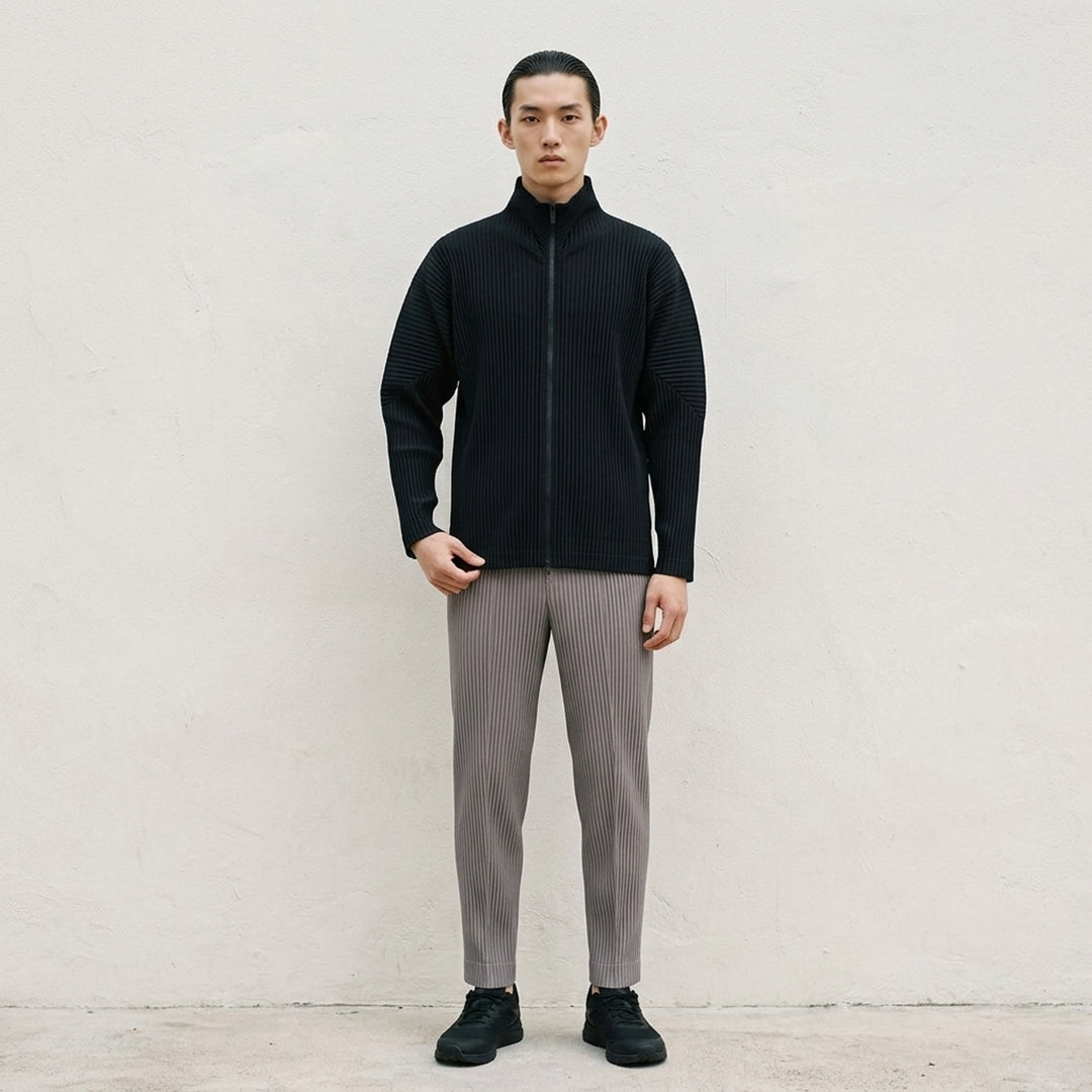 Homme Plissé Issey Miyake Basics Zip-Up Cardigan in light grey with all-over steam pleating, funnel neck, and full-length tonal zip, displayed flat on white background - lifestyle