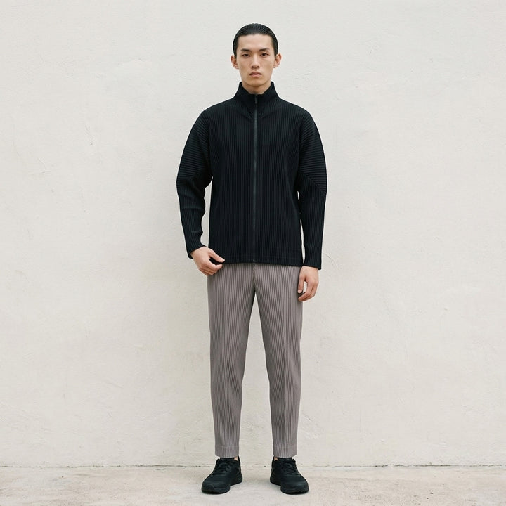 Homme Plissé Issey Miyake Basics Zip-Up Cardigan in light grey with all-over steam pleating, funnel neck, and full-length tonal zip, displayed flat on white background - lifestyle