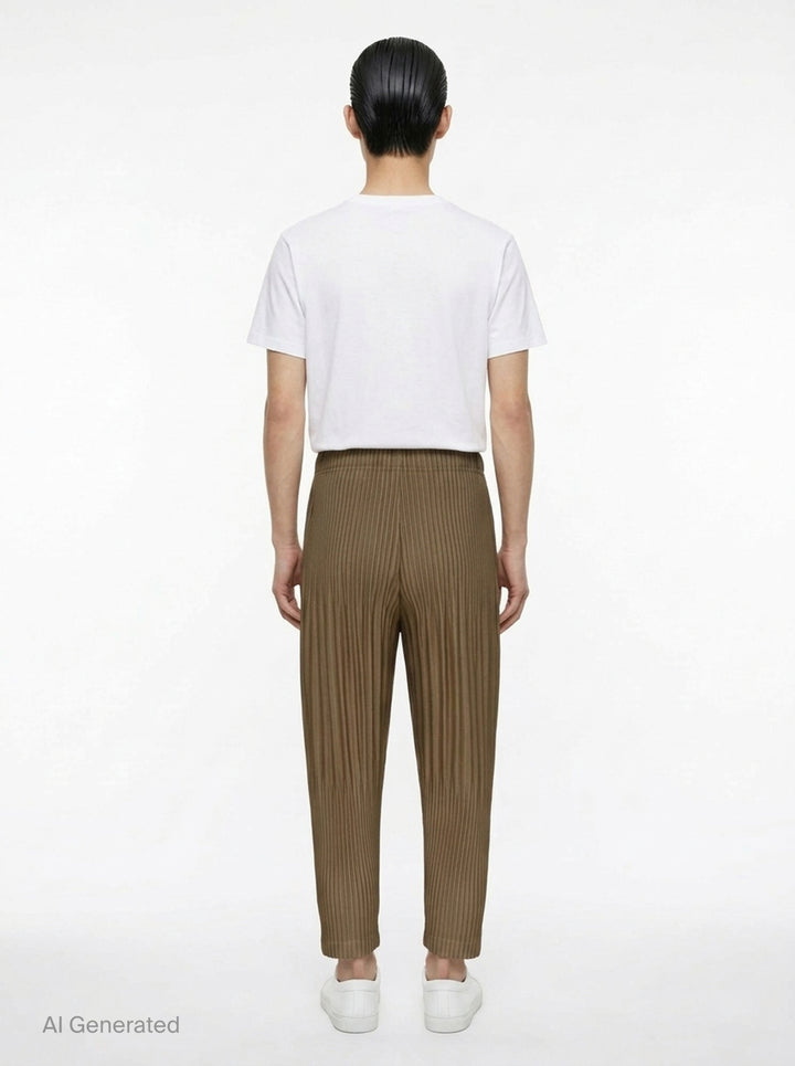 Homme Plissé Issey Miyake Color Pleats 2 pleated pants in teal, featuring all-over vertical pleating, elasticated waistband, and tapered cropped leg - back
