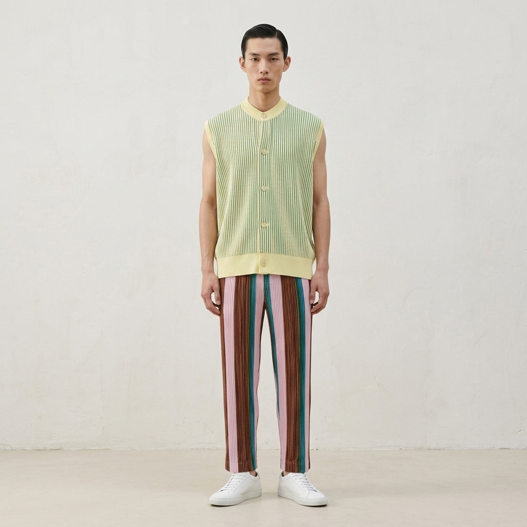 Homme Plissé Issey Miyake In The Shadow Knit sleeveless button-up cardigan in black and white vertical ribbed stripes - lifestyle