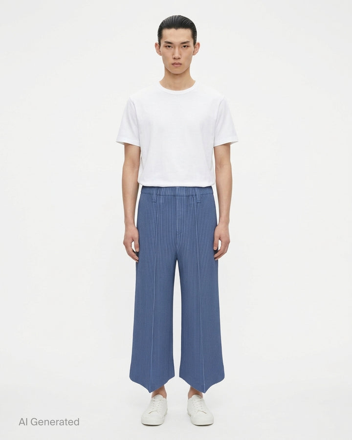 Dark brown Homme Plissé Issey Miyake Kersey Pleats pleated wide-leg pants with a pointed hem, shown from the front - front