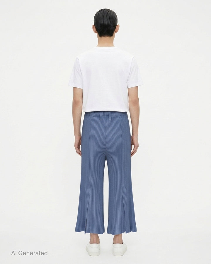 Dark brown Homme Plissé Issey Miyake Kersey Pleats pleated wide-leg pants with a pointed hem, shown from the front - back