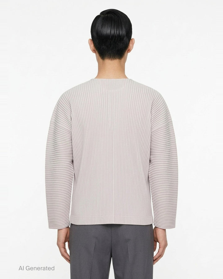 Homme Plissé Issey Miyake Monthly Colors September long-sleeve pleated top in black, featuring all-over accordion pleating and a tonal Henley button neckline - back