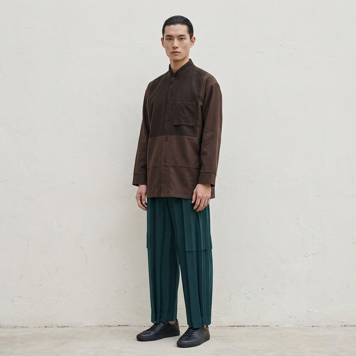 Homme Plissé Issey Miyake Press long sleeve shirt in two-tone brown and dark olive colour-block with band collar, button front and chest pocket - lifestyle