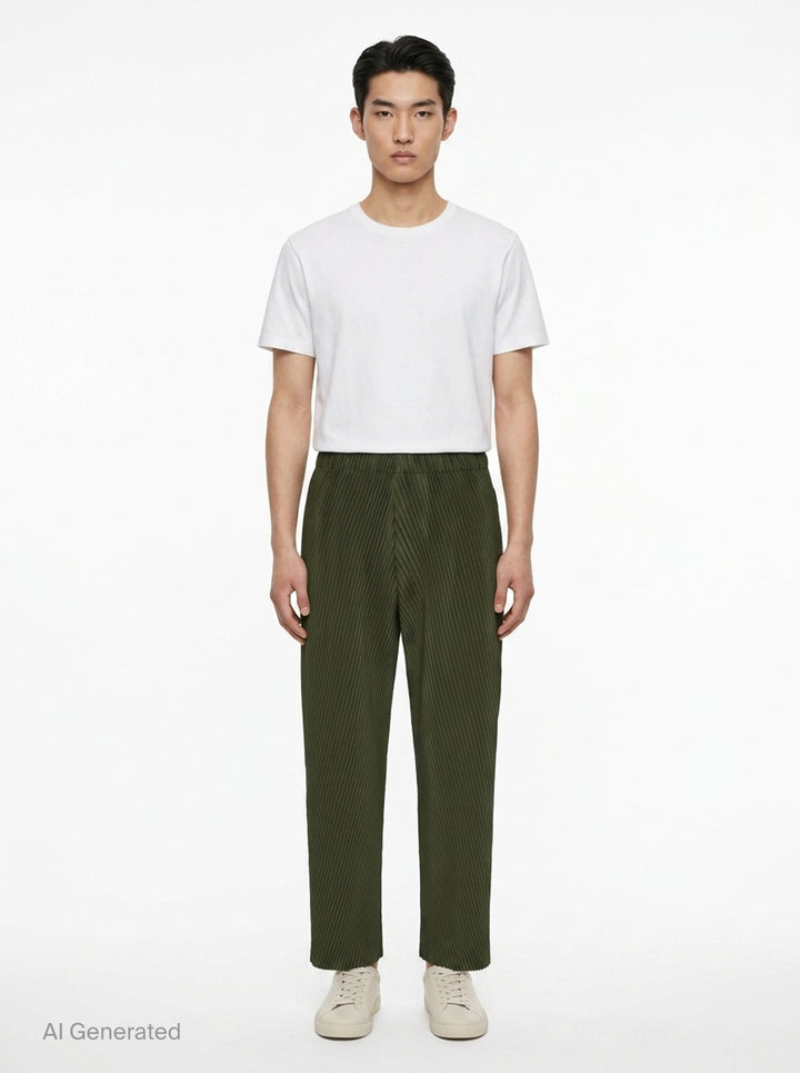 Homme Plissé Issey Miyake Slash Pleated Pants in olive green with signature diagonal micro-pleat construction and elastic waistband, relaxed tapered silhouette - front