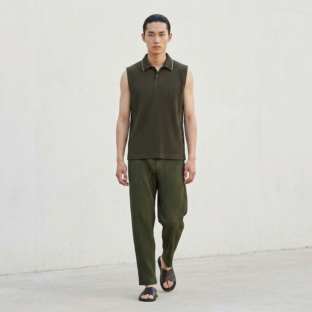 Homme Plissé Issey Miyake Slash Pleated Pants in olive green with signature diagonal micro-pleat construction and elastic waistband, relaxed tapered silhouette - lifestyle
