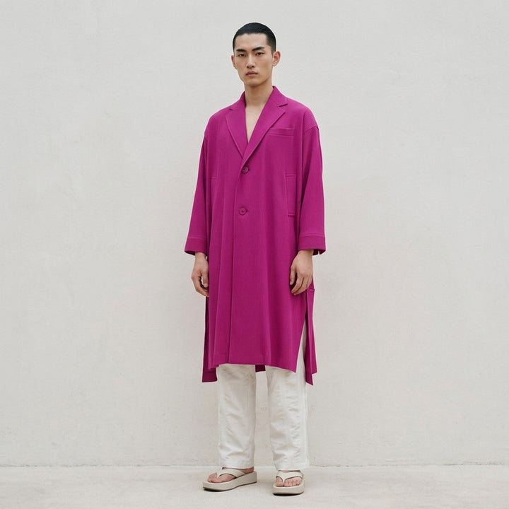 IM Men Breeze Drape Coat in black — oversized A-line silhouette with notched lapels, two-button closure, patch pockets, three-quarter sleeves, and hem zip vents - lifestyle
