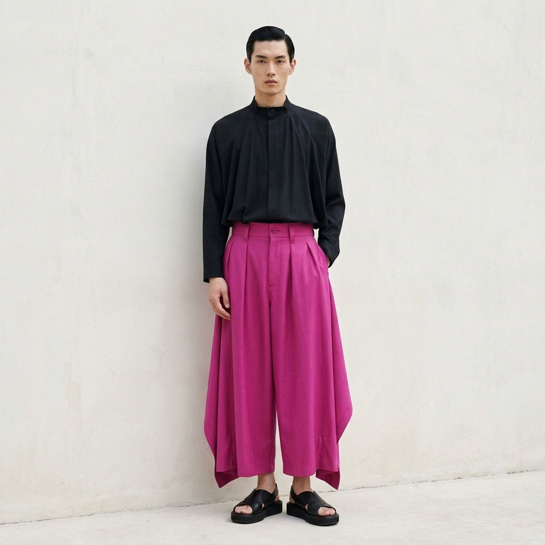 IM MEN Breeze Drape Woven Pants in fuchsia pink — high-waisted pleated wide-leg trousers with dramatic asymmetric draped fabric panels, shown flat on white background - lifestyle