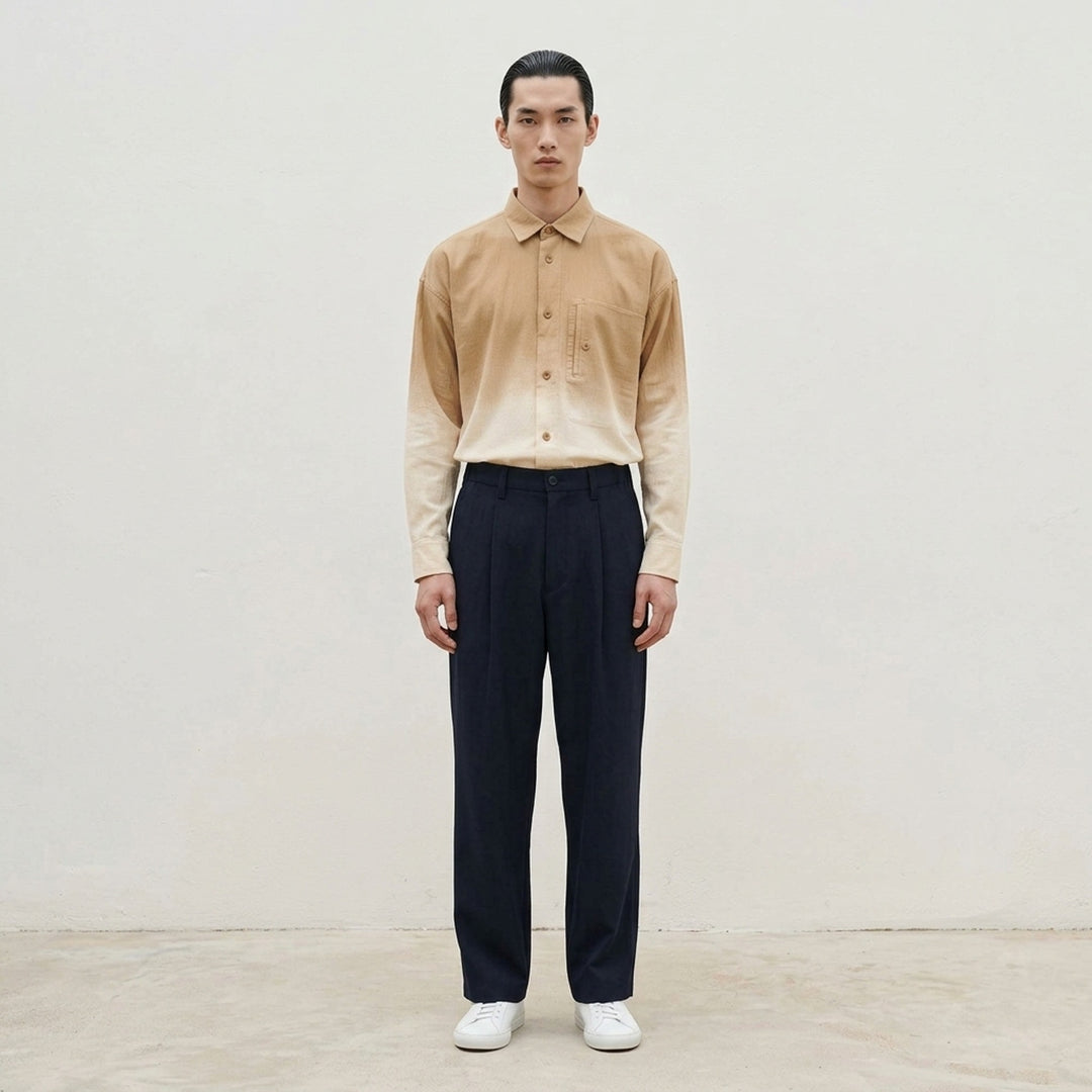 IM MEN FRONT BACK Woven Pants in taupe — relaxed wide-leg silhouette with double-pleat front, button waistband, and clean hemline, front view - lifestyle