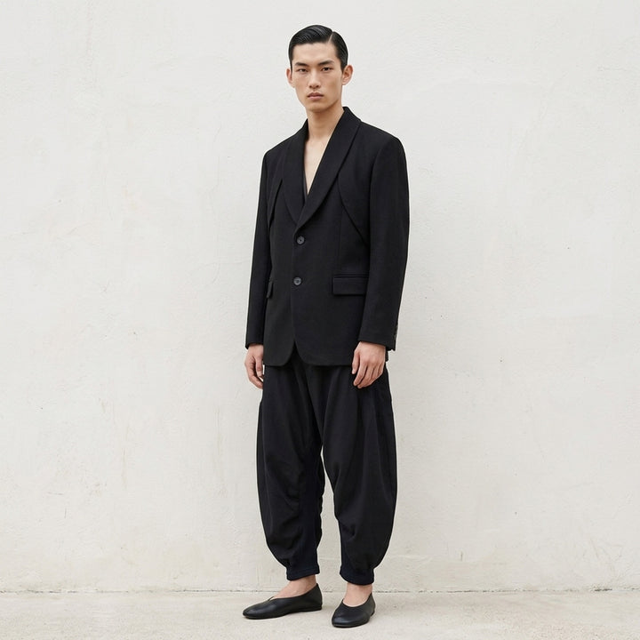 IM MEN Shrink Wool black two-button jacket with shawl collar, layered panel detailing and flap pockets - lifestyle