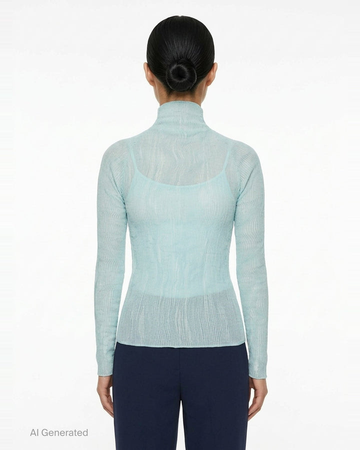 Rear view of Issey Miyake Chiffon Twist 2 woven top in grey, featuring fine horizontal pleating, a high funnel neck, and long fitted sleeves on a mannequin - back