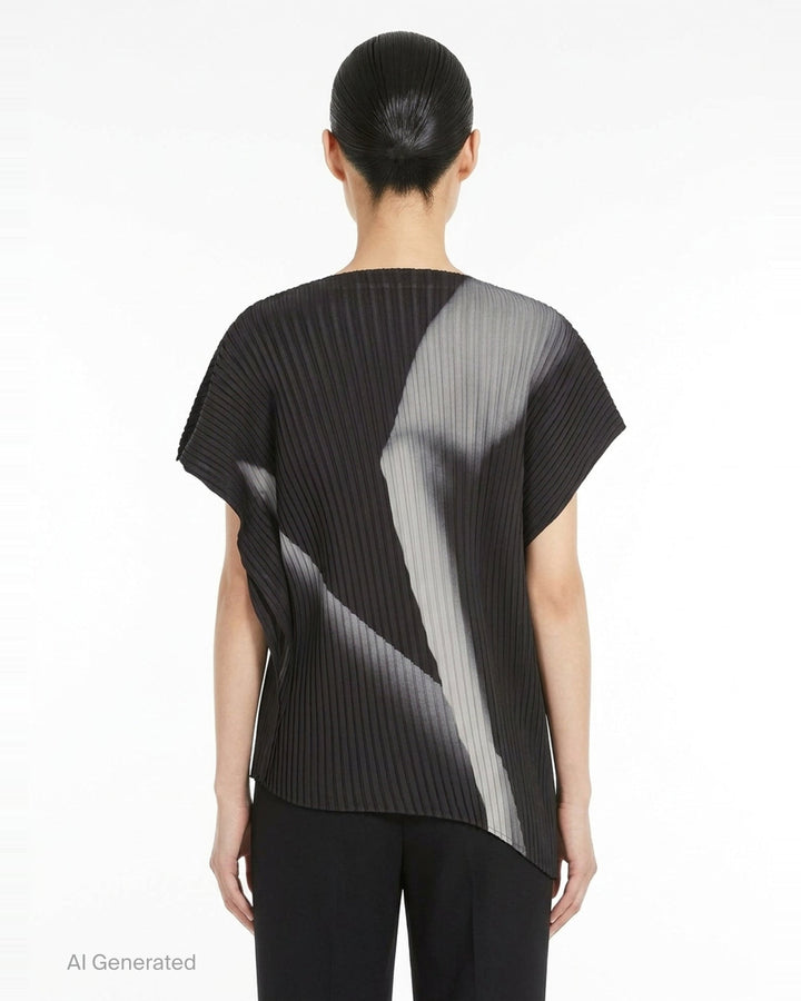 Issey Miyake Hands of Lover Pleats top in black micro-pleated fabric with an abstract monochrome photographic print, cap sleeves, and an asymmetric hemline - back