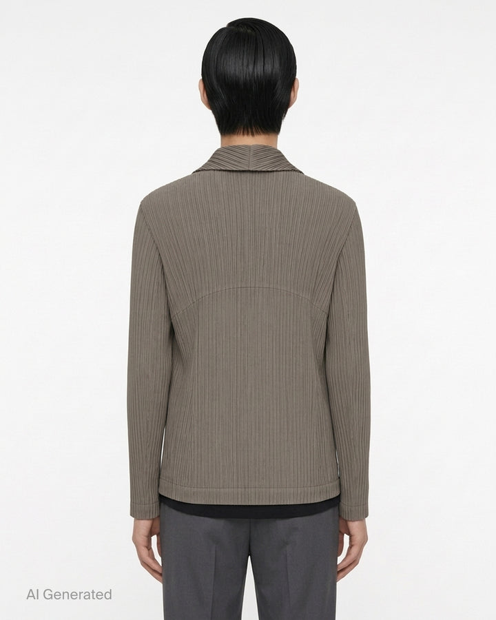 Black pleated single-button jacket with notched lapels by Issey Miyake, shown from the front - back