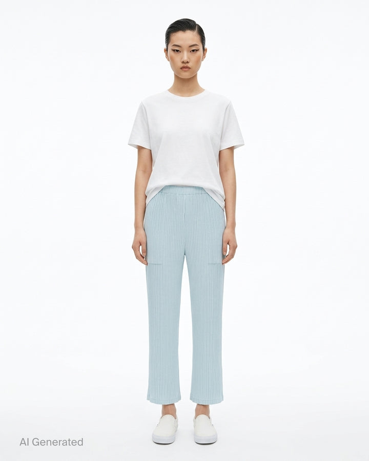 Issey Miyake Hatching Pleats pleated pants in muted taupe-grey with elasticated waist, patch pockets and straight leg, front view - front