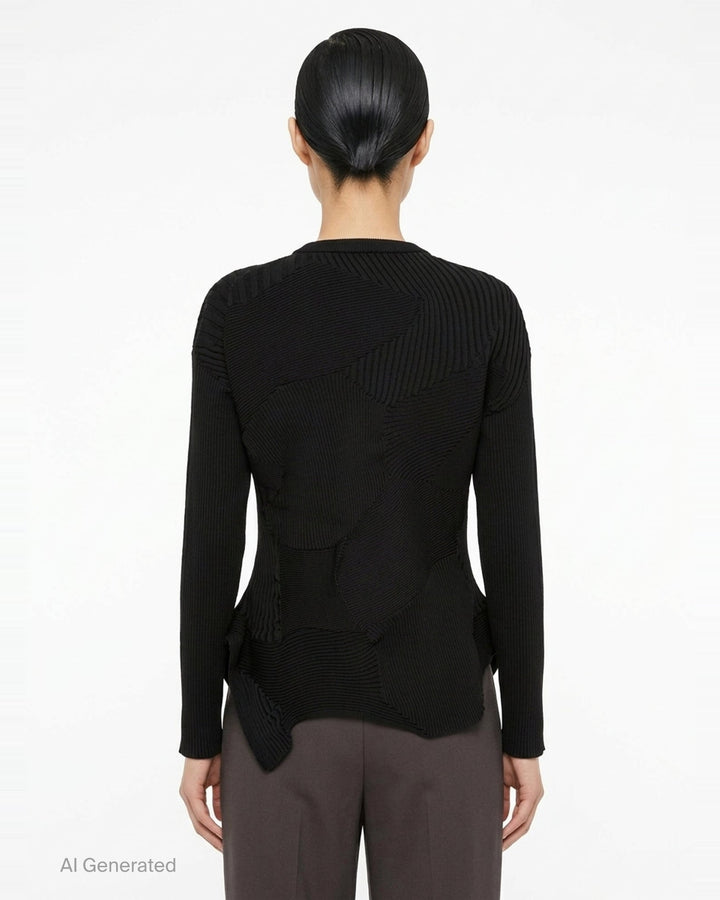 Issey Miyake KONE KONE black knit top with multi-directional ribbed panels, asymmetric pointed hem, and long sleeves — rear view on white background - back