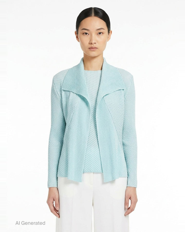 Issey Miyake Misty Pleats black pleated open-front cardigan, rear view, showing draped lapel collar, textured pleated fabric, long sleeves, and asymmetric hem - front