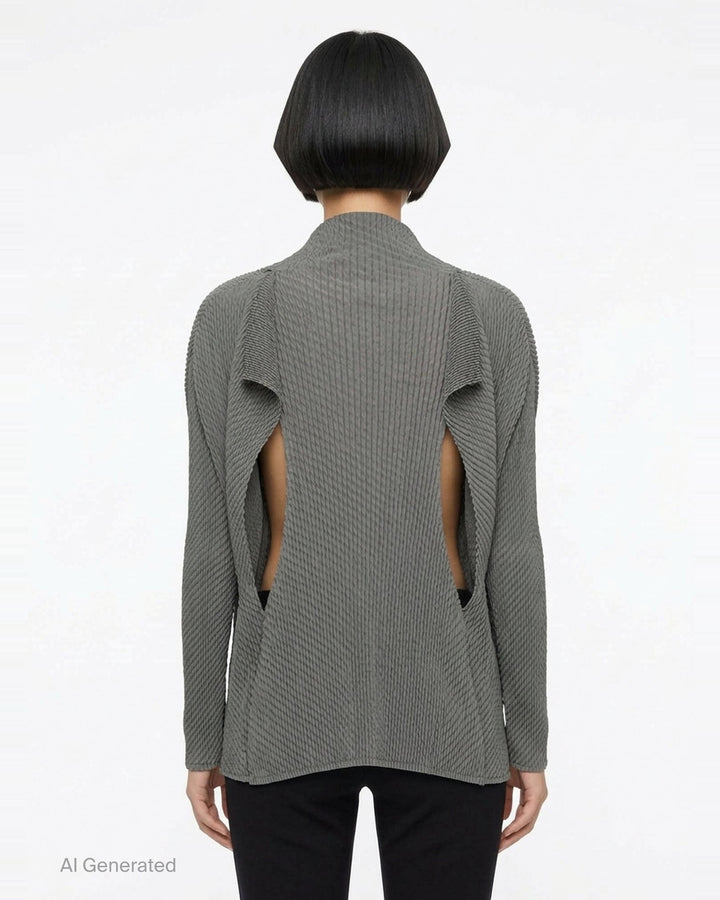 Issey Miyake Misty Pleats black pleated open-front cardigan, rear view, showing draped lapel collar, textured pleated fabric, long sleeves, and asymmetric hem - back