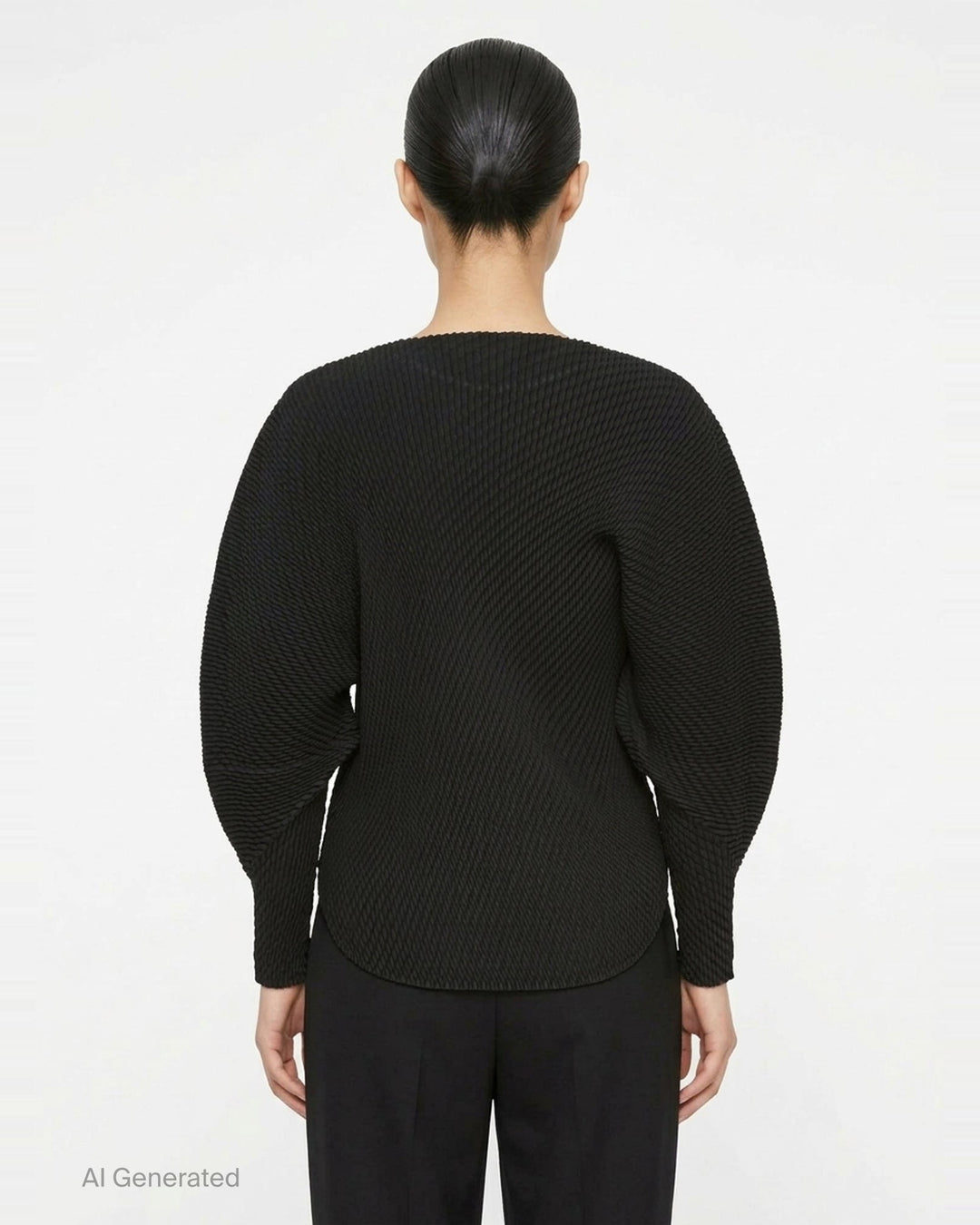 Issey Miyake Misty Pleats black pleated top, rear view, showing all-over relief pleat texture, batwing sleeves with fitted cuffs, and ribbed crew neckline - back