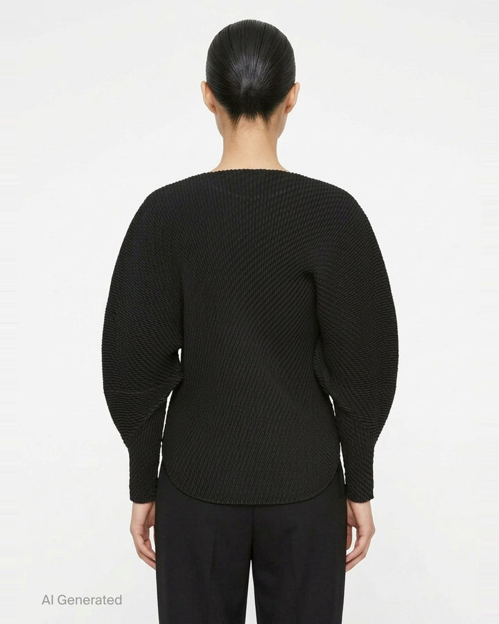 Issey Miyake Misty Pleats black pleated top, rear view, showing all-over relief pleat texture, batwing sleeves with fitted cuffs, and ribbed crew neckline - back