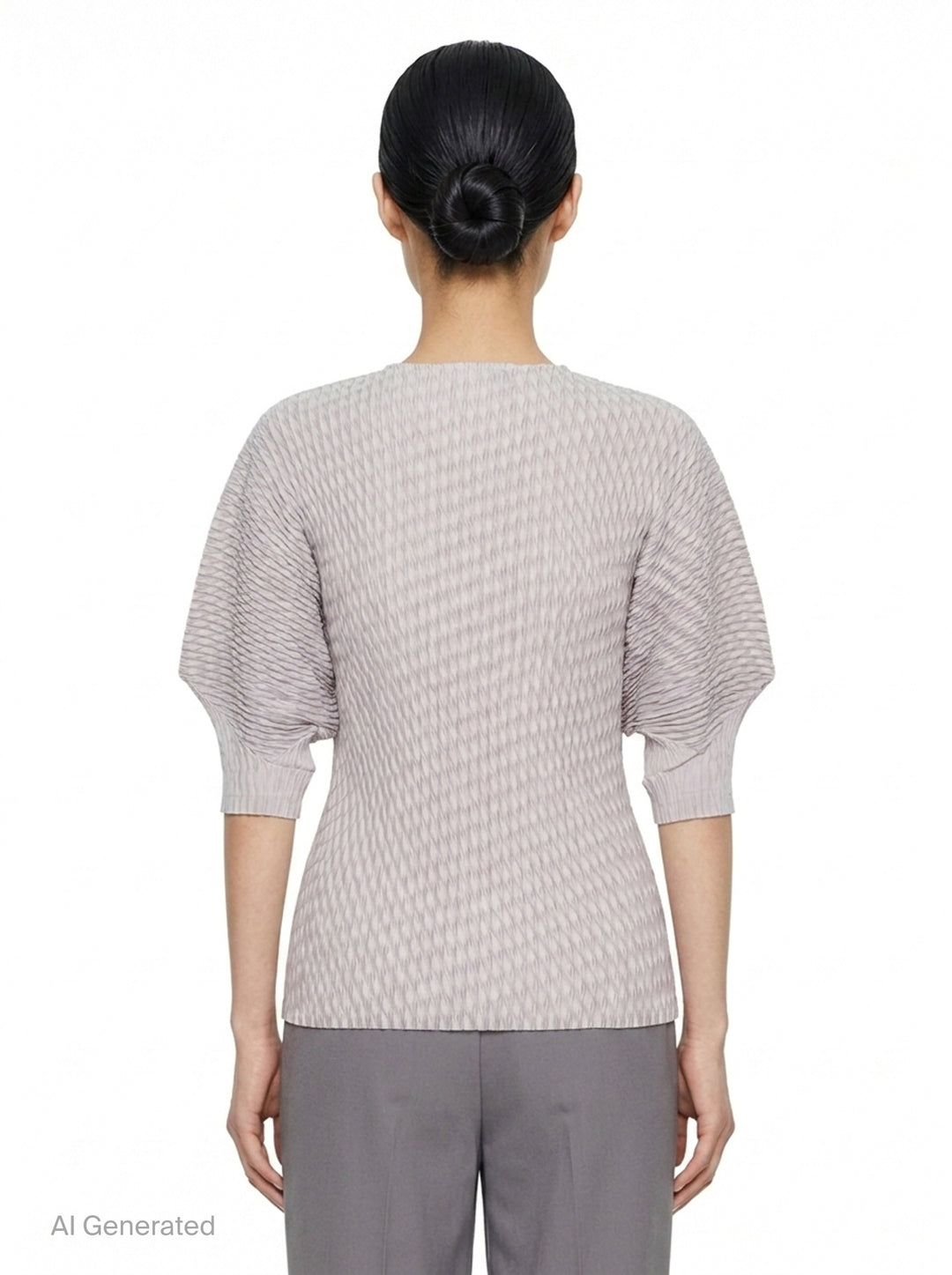Sleek Pleats | Issey Miyake | Club21 - back