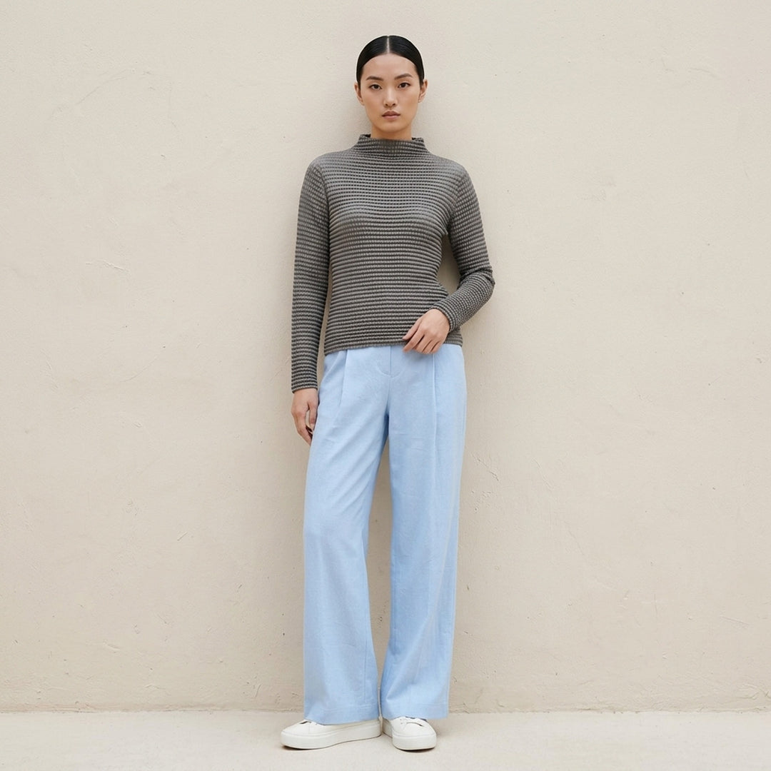 Issey Miyake Suede Like Pleats black pleated mock neck long sleeve top with ribbed texture - lifestyle
