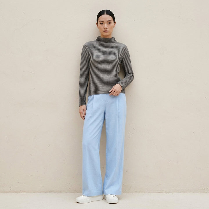 Issey Miyake Suede Like Pleats black pleated mock neck long sleeve top with ribbed texture - lifestyle