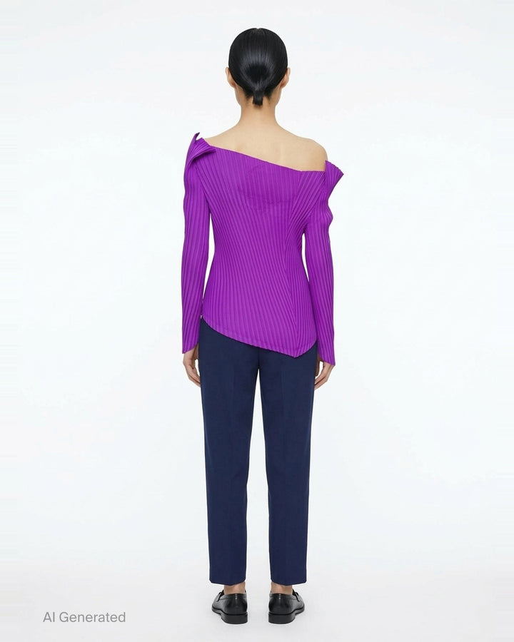 Issey Miyake Tubular Pleated Top in black, featuring vertical accordion pleating, an off-shoulder asymmetric neckline, long sleeves with pointed cuffs, and an angled hem - back