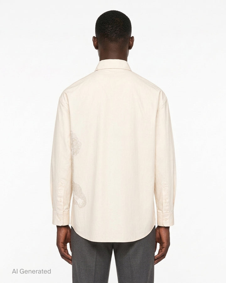 Jacquemus Pisco long sleeve cream shirt with an oversized tonal poodle print and a contrast dark button at the eye - back