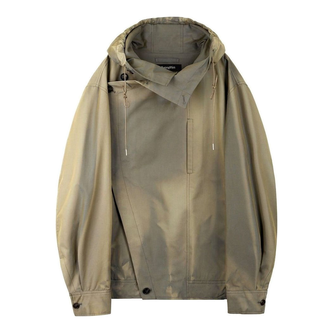 JiyongKim Sun-Bleached Oversized Jacket in faded olive-khaki with asymmetric button closure, drawcord hood and rounded sleeves, shown flat against a white background - packshot