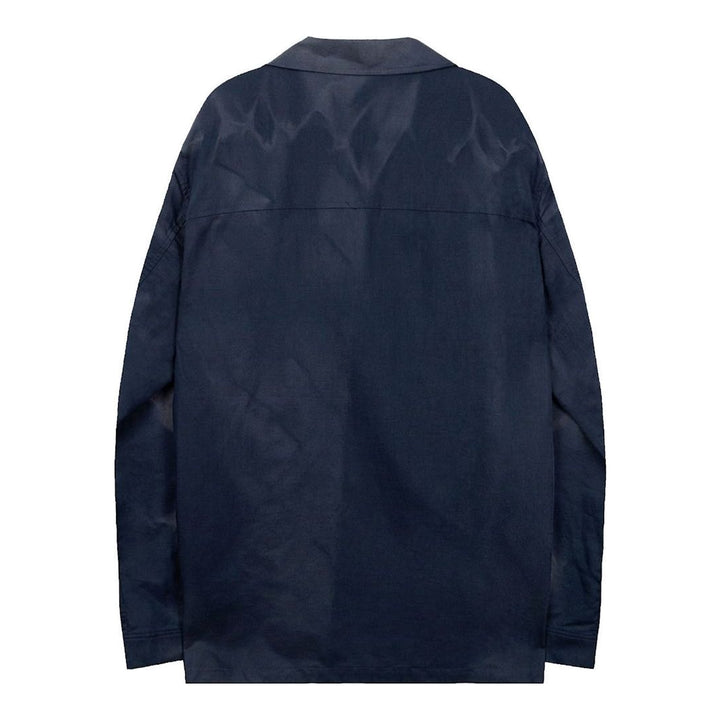 JiyongKim Sun-Bleached Strap Shirt in navy with faded finish, camp collar, chest pocket and button strap sleeves - packshot