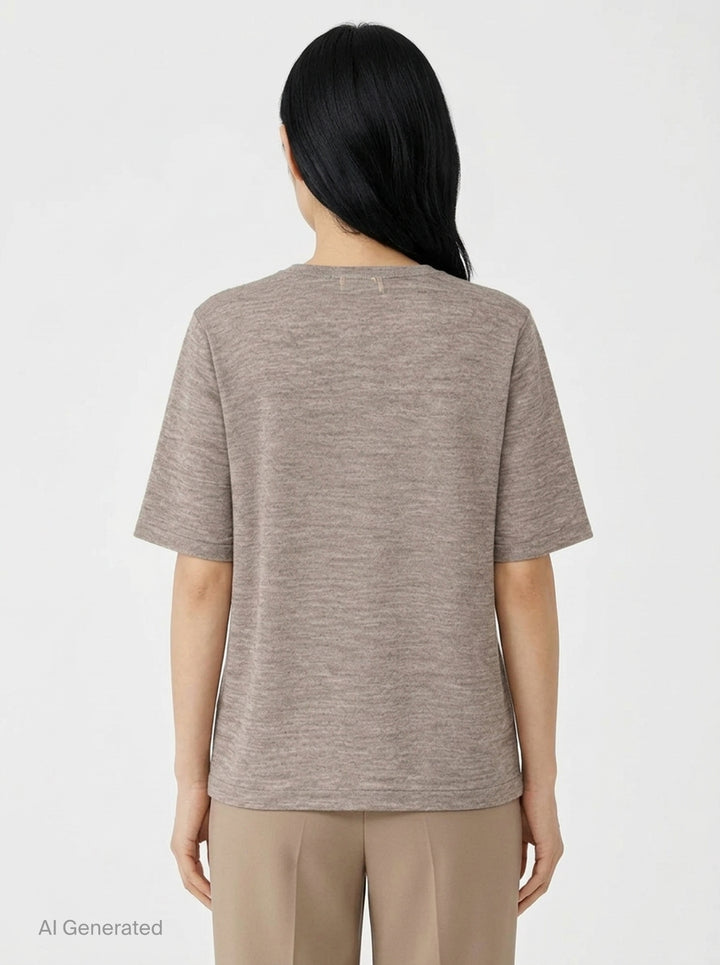 Lauren Manoogian Fine Henley knit top in heathered taupe with short sleeves, a round neck, and a partial button placket, shown flat on a white background - back