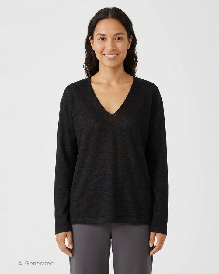 Lauren Manoogian Fine Low V-Neck Sweater in charcoal, featuring a deep V-neckline, oversized relaxed silhouette, dropped shoulders, and long sleeves, shown flat on a white background - front