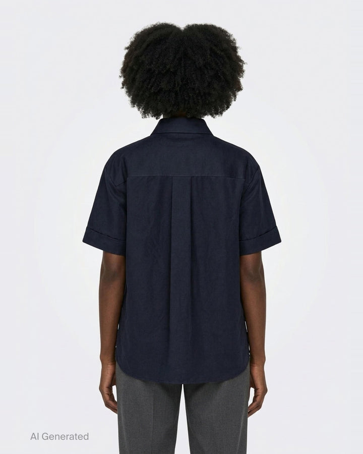 Lee Mathews Powell Short Sleeve Shirt in navy, featuring press-stud closure, turned-back cuffs, pointed collar, and a tonal chest pocket - back