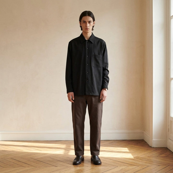 Lemaire black wool gabardine overshirt with pointed collar, snap-button front and chest patch pocket - lifestyle
