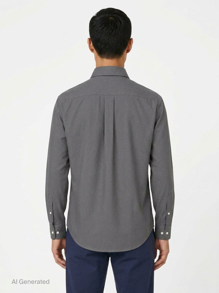 Lemaire Regular Long Sleeve Washed Cotton Shirt in slate grey, displayed flat against a white background, featuring a classic collar, white buttons, and a chest patch pocket - back
