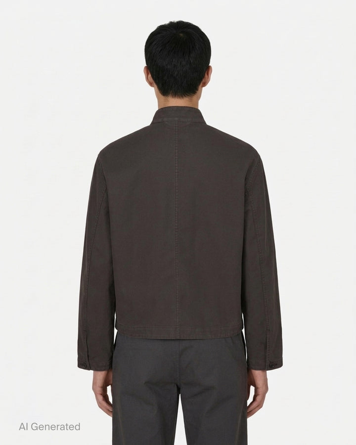 Lemaire cropped stand collar jacket in heavy dark cotton with button-through front and patch pockets - back