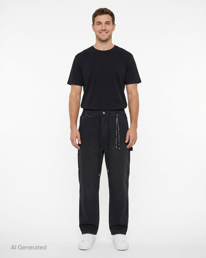Mastermind stone washed straight easy pants in faded black with drawstring waist, hammer loop and branded cord detail - front