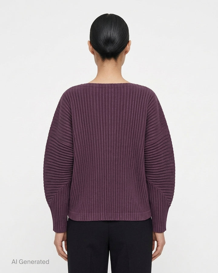 me Issey Miyake Corduroy Pleats long sleeve top in black with boat neckline, sculpted pleated sleeves and cross-stitch detail at the neck - back