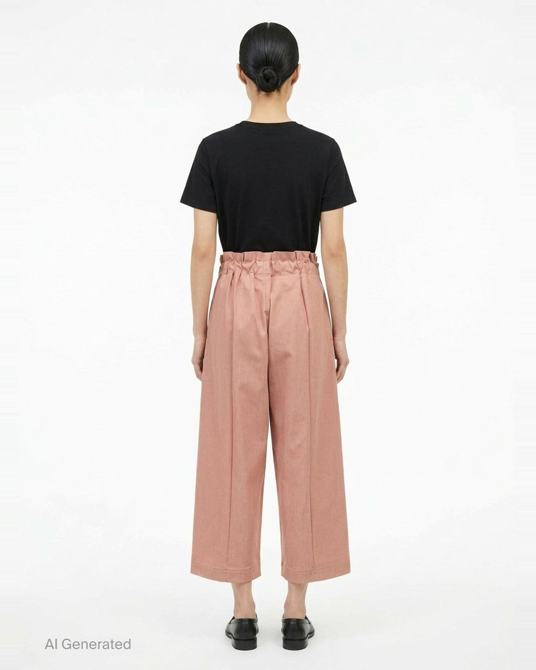 me Issey Miyake Flat Denim Seasonal Pants in dusty rose — wide-leg culotte silhouette with front pleats, utility clip buckle waistband, and cuffed hem, shown flat against a white background - back