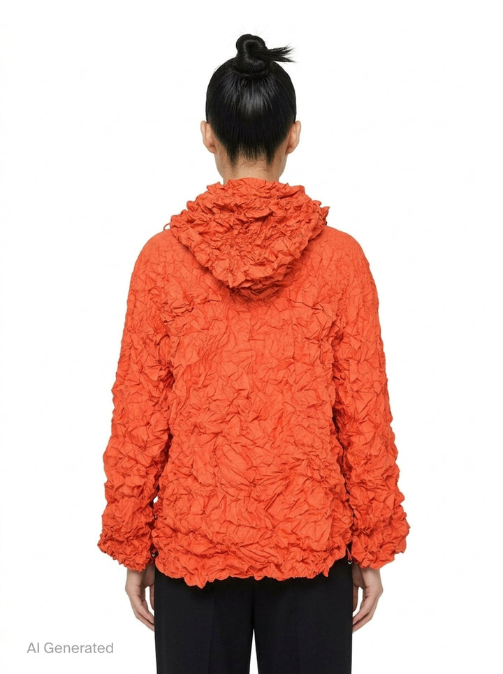 me Issey Miyake Meringue Parka in black — oversized crinkled blouson with ruched hood, snap-button front, and drawstring hem and cuffs - back
