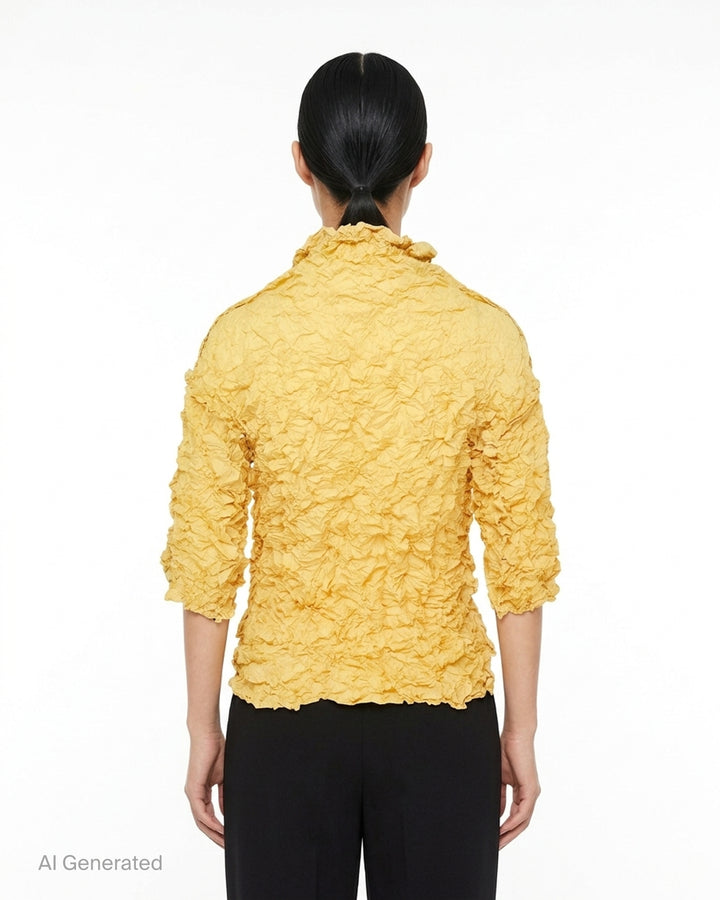 me Issey Miyake Meringue Top in black with allover crinkled texture, funnel neckline and short sleeves - back