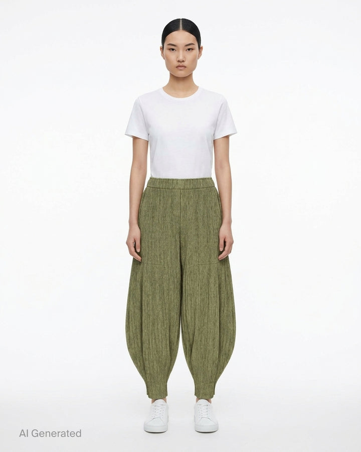 me Issey Miyake Mix Fine Knit Pleats Bottom in mottled olive green with elasticated waist and balloon-shaped pleated legs - front