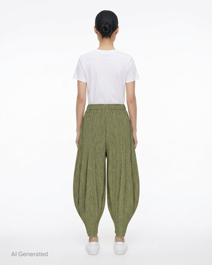 me Issey Miyake Mix Fine Knit Pleats Bottom in mottled olive green with elasticated waist and balloon-shaped pleated legs - back