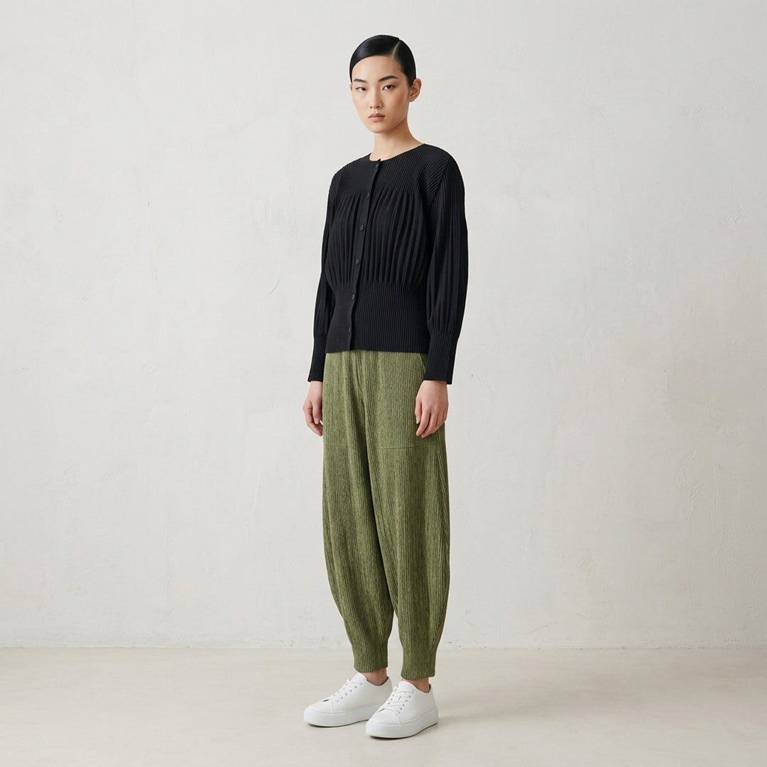 me Issey Miyake Mix Fine Knit Pleats Bottom in mottled olive green with elasticated waist and balloon-shaped pleated legs - lifestyle
