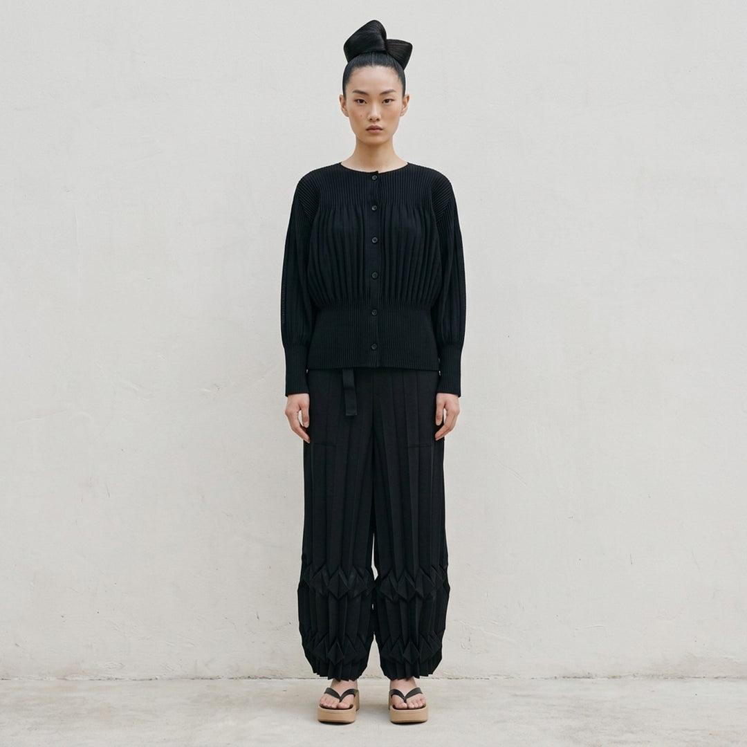 me Issey Miyake black pleated button-front cardigan with gathered waist and rounded sleeves - lifestyle